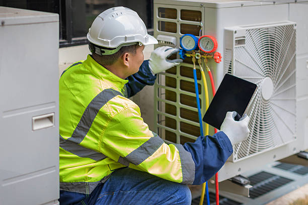 Professional Ac Installation technician working in Milton, MA